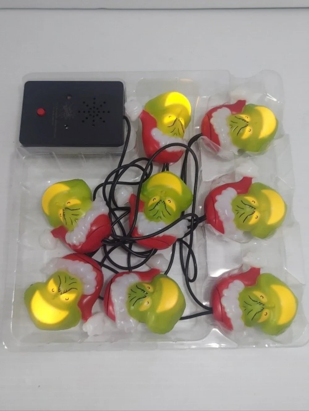 The Grinch Musical Light String - Green & Red Grinch Heads